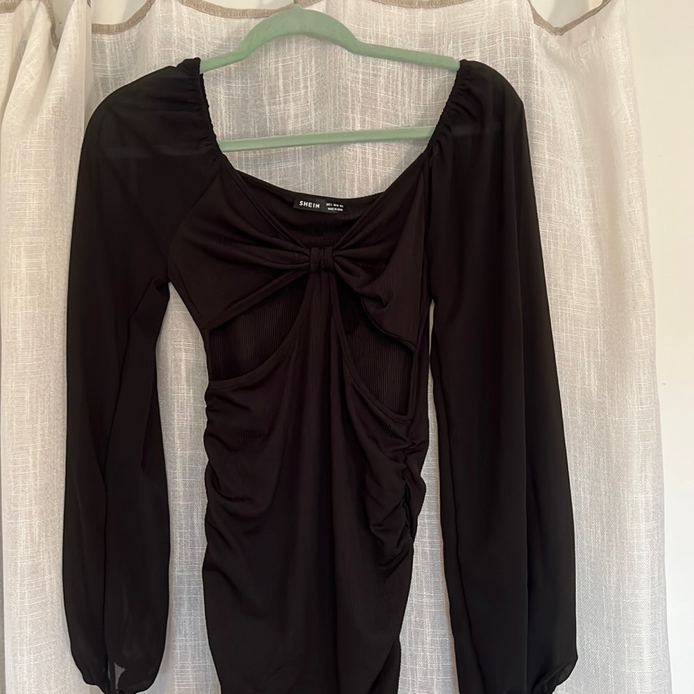 Black cut out long sleeve dress size small. Never worn